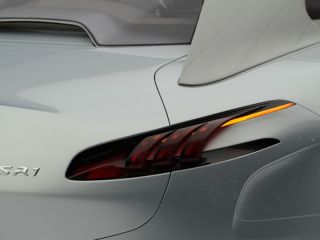 Ошибочка вышла: Peugeot презентовала в Женеве Aston Martin (7 ФОТО)
